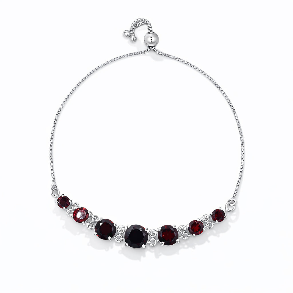 Garnet Seven Stone Charm Bracelet in 925 Silver