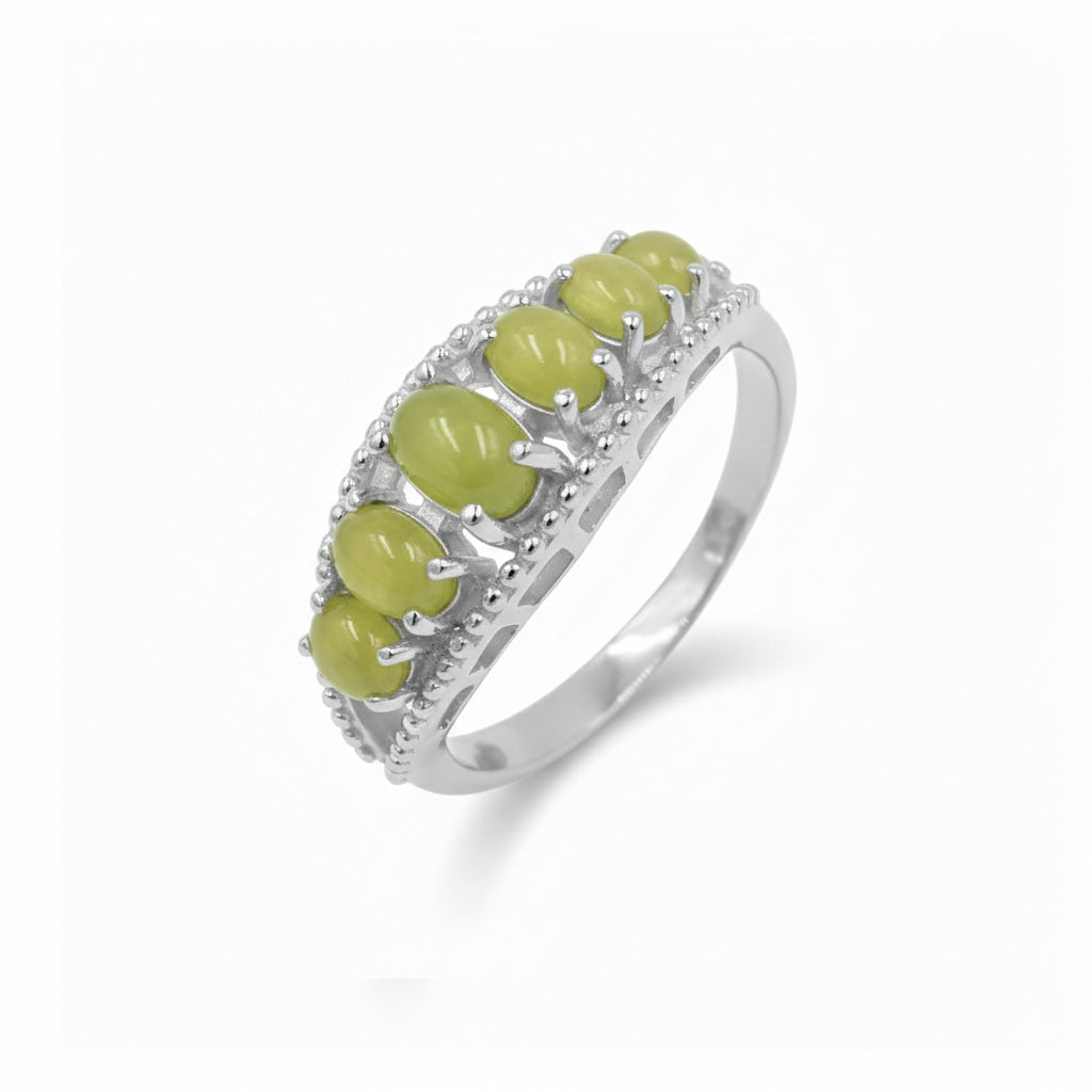 Three Eye Goddess Peridot Cabochon Ring in 925 Silver