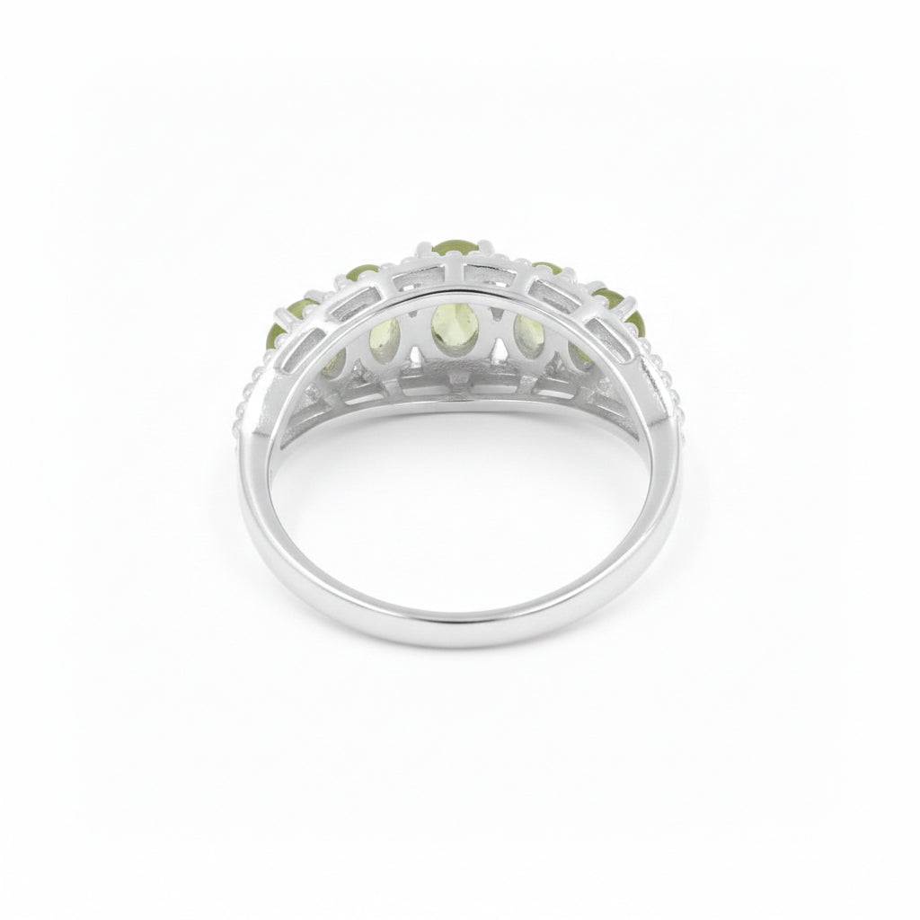 Three Eye Goddess Peridot Cabochon Ring in 925 Silver